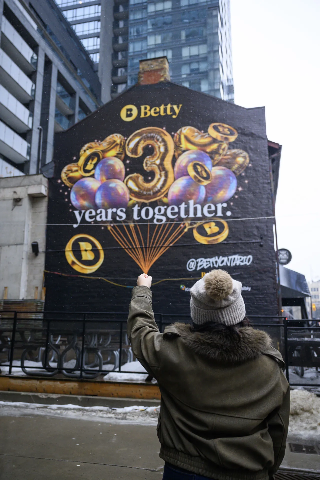 A Betty mural in Toronto celebrating three years together.